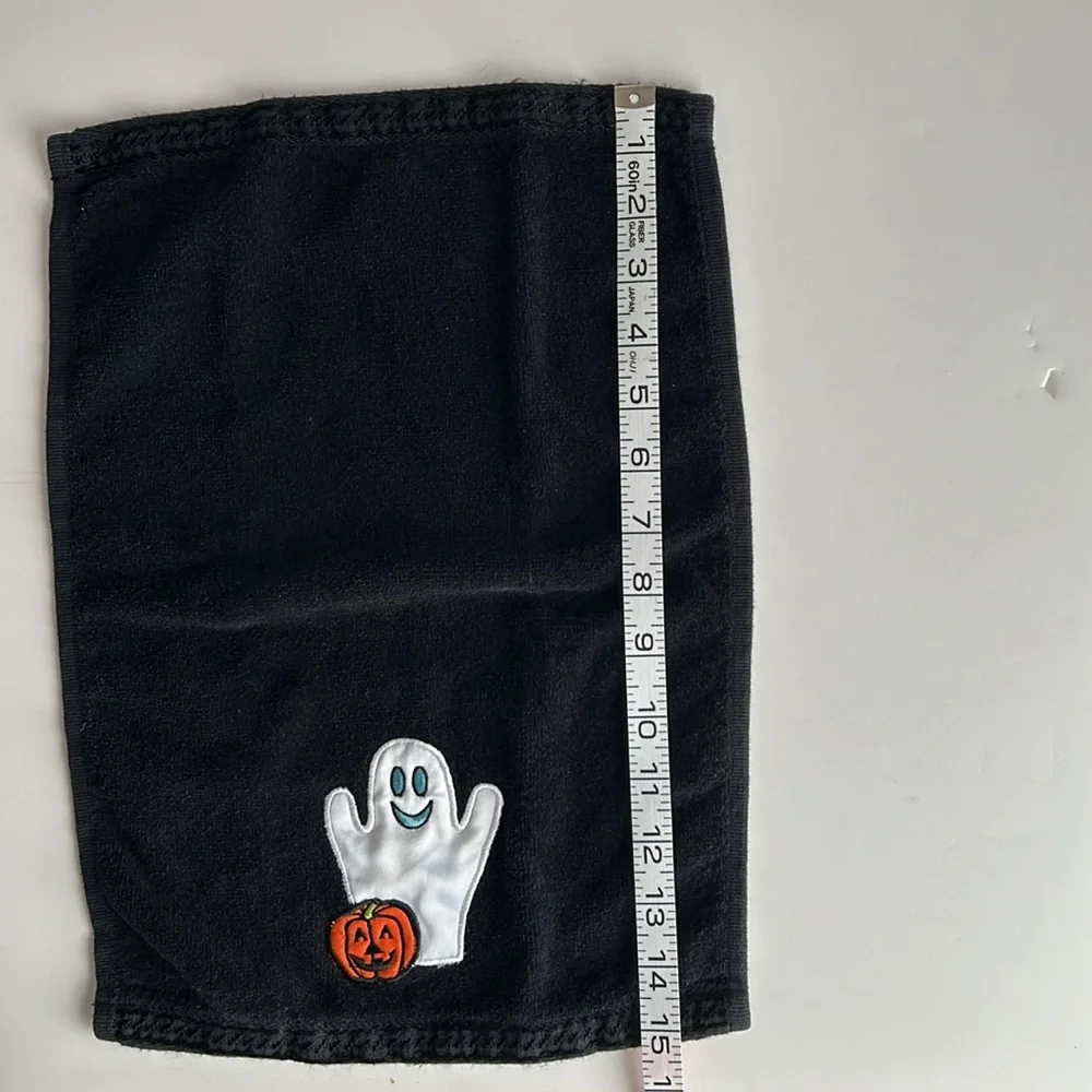 Halloween hand towels with a friendly ghost and pumpkin appliqué
